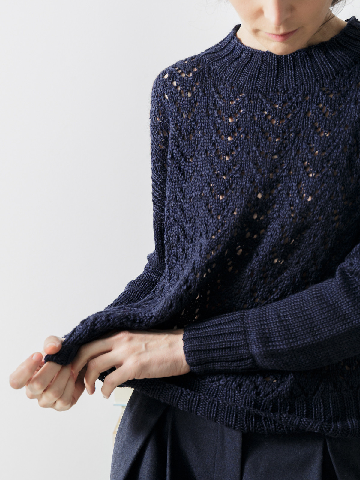 Cropped lacy knit sweater Image