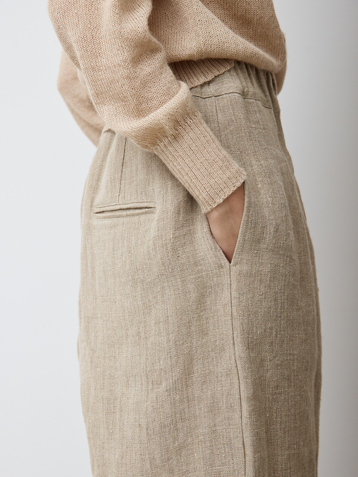 Raw linen pleated trousers with belt Image