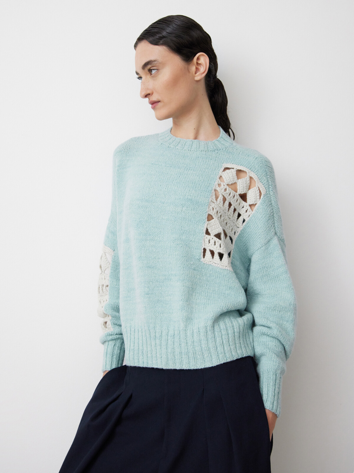 Mending crochet sweater Image