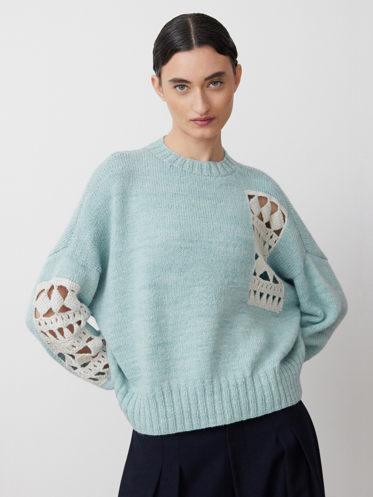 Mending crochet sweater Image