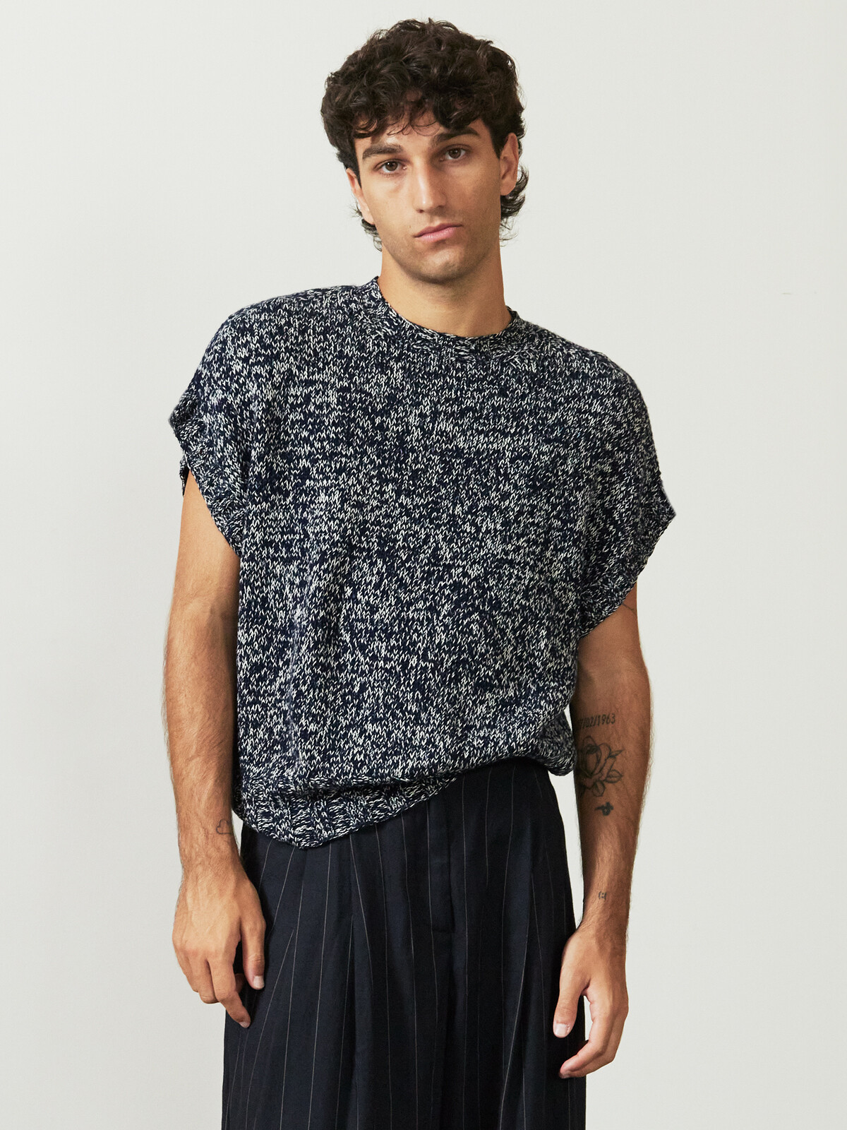 Buttoned sleeve sweater Image