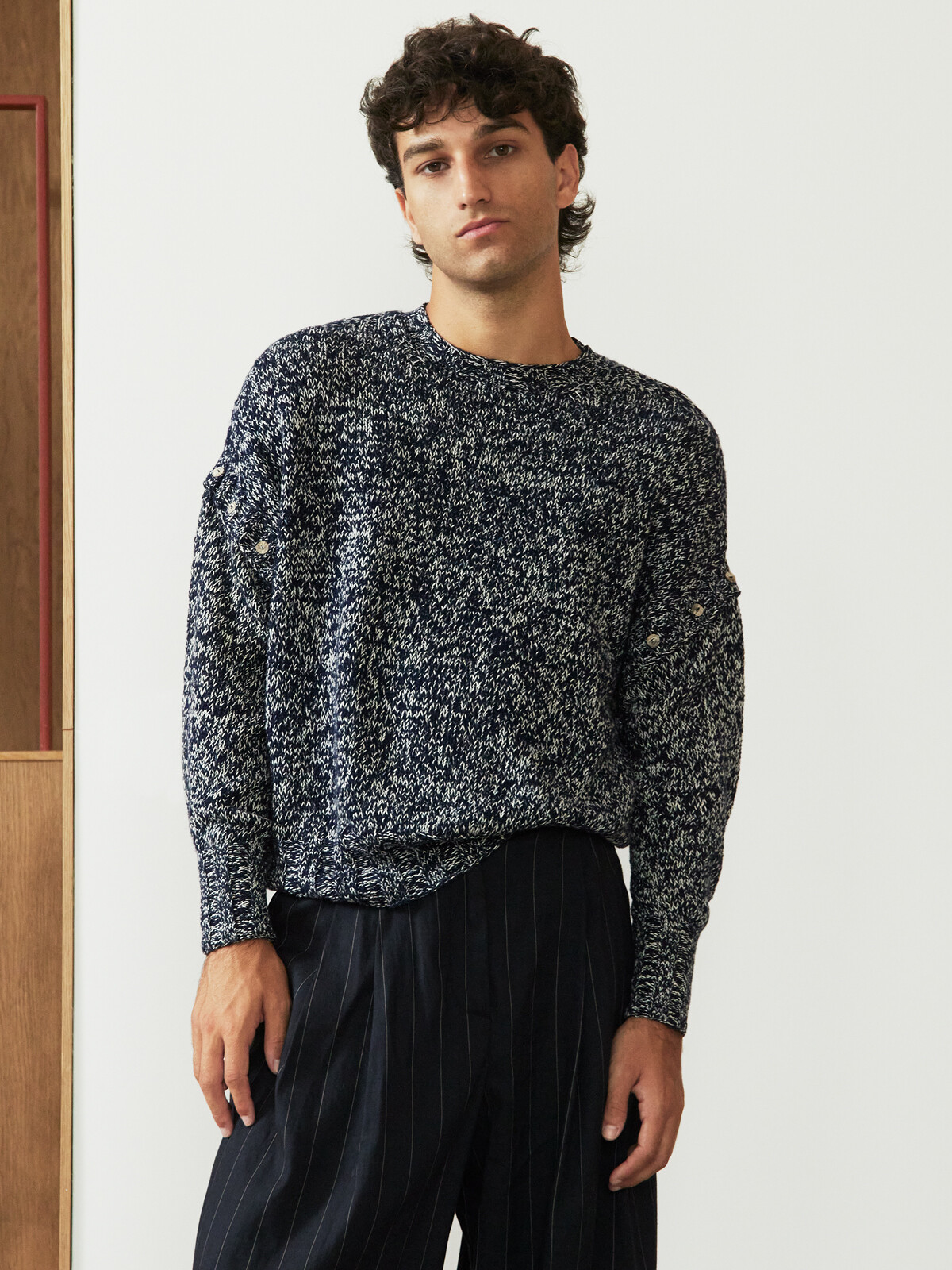 Buttoned sleeve sweater Image