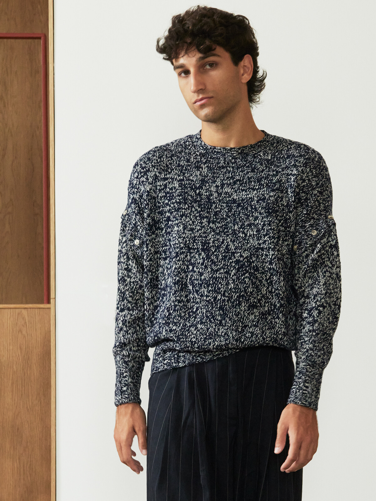Buttoned sleeve sweater